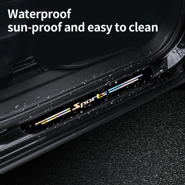 Black car door sill protector vinyl decals with colorful stripes on a dark surface.