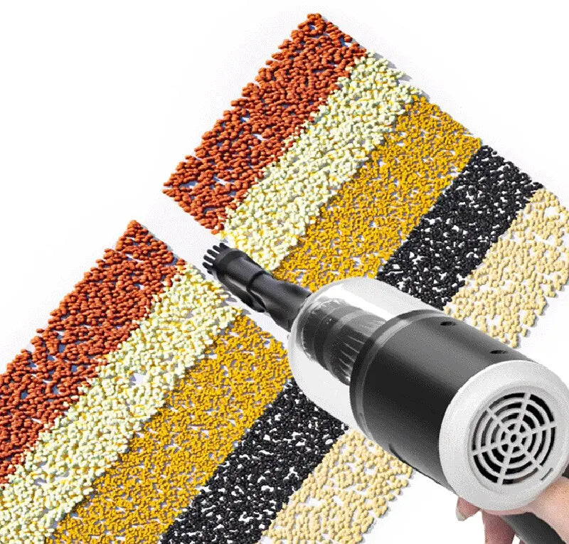 Aspirateur de voiture sans fil haute puissance à côté d'un assortiment coloré de têtes d'aspiration.