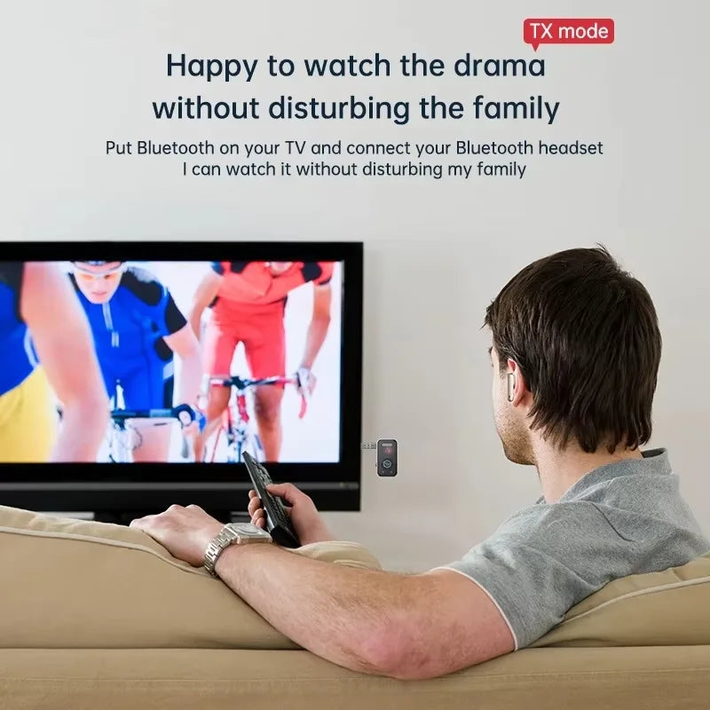 A man is watching TV with a Bluetooth headset to enjoy drama without disturbing his family.