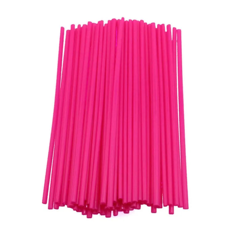A bundle of bright pink motorcycle wheel rim spoke wrap kits.