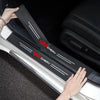 Man applying adhesive protection stickers to the car door sill.