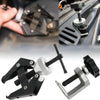 A set of heavy-duty wiper arm removal tools used for windshield repair, showing various components and grips.