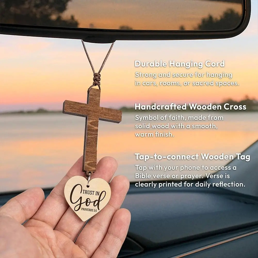 A handcrafted wooden cross hanging cord and tag for faith reminder use in cars or rooms.