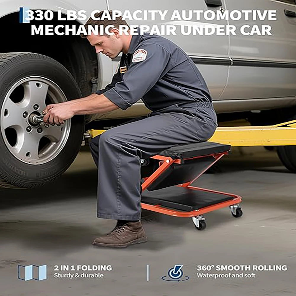 A mechanic works under a car, using a 2-in-1 folding seat for access. The seat is gray and orange.