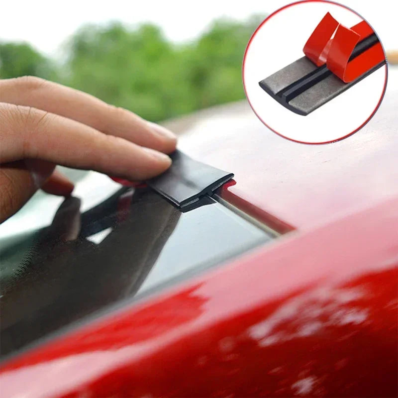A hand applies a black seal strip to the edge of a red car windshield, demonstrating a car windseal installation.