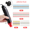 A black heat shrink wire terminal tool and various sizes of plastic tubing for soldering and electrical work.
