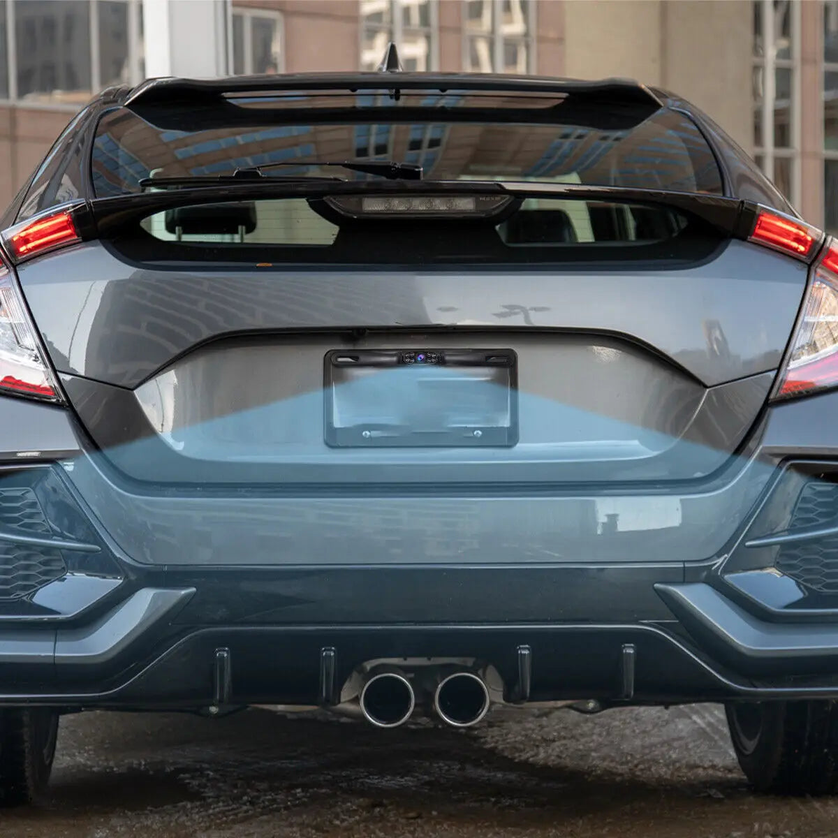 Rear view of a car with a mounted HD wired backup camera and night vision features.