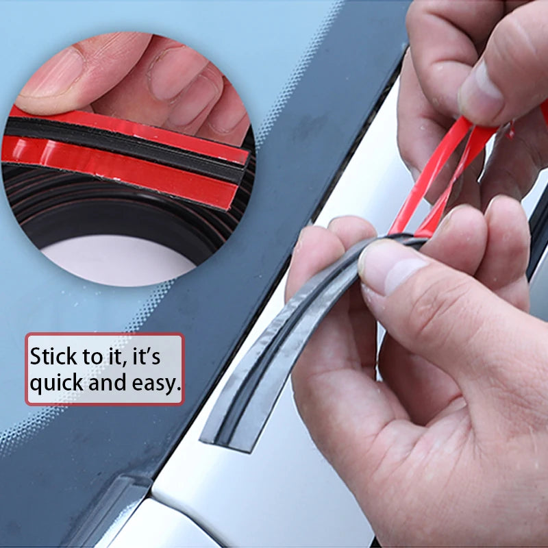 Hands are applying a red sealing strip to a car window or roof using a tool.