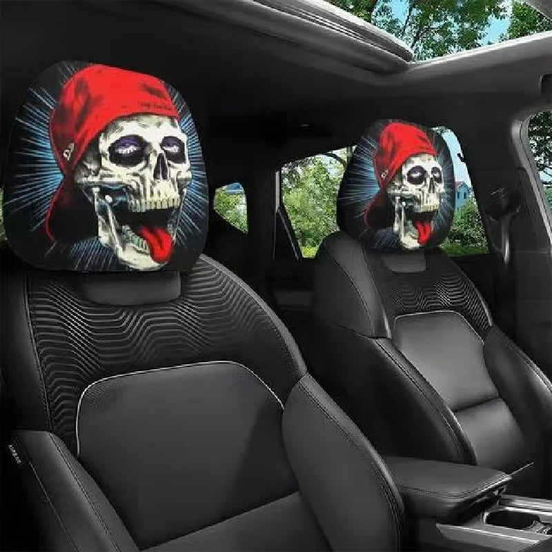 Two Halloween horror skull face car headrest covers installed in a black car seat.