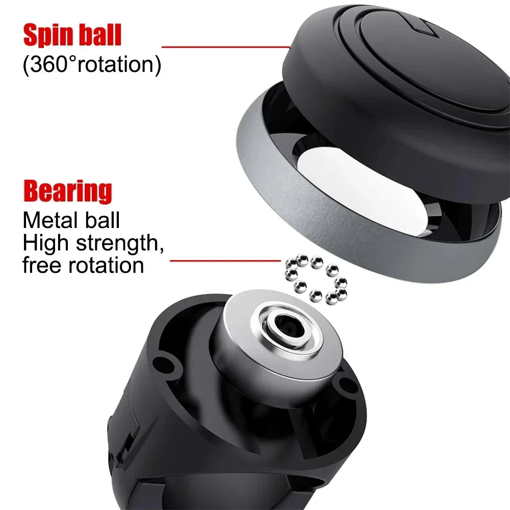Close-up view of a black universal steering wheel booster knob showing the spin ball and bearing components.