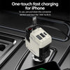 A white car charger device is shown with a connector, positioned above a smartphone.