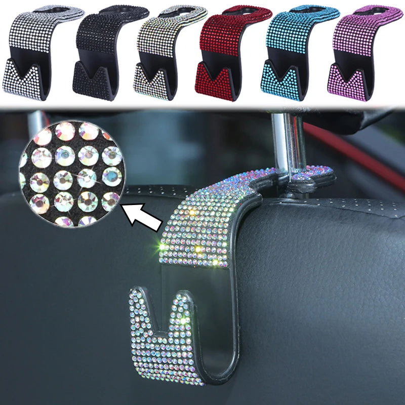 A set of colorful, glitter-encrusted headrest storage hooks for a car seat back.