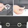 Close-up of a PU leather car seat cover with anti-slip grips and buckles for driver seat protection