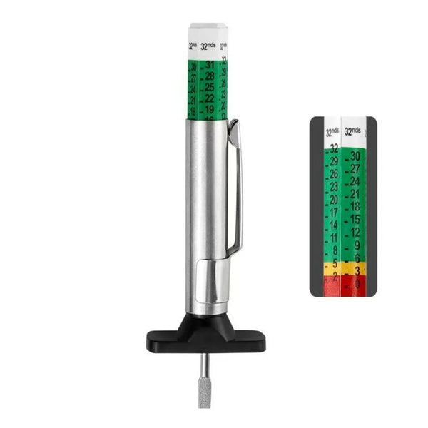 A silver precision tire tread depth gauge with colored markings for measuring tire wear.