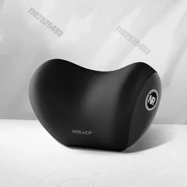 A black ergonomic lumbar and neck support cushion is shown on a white surface.