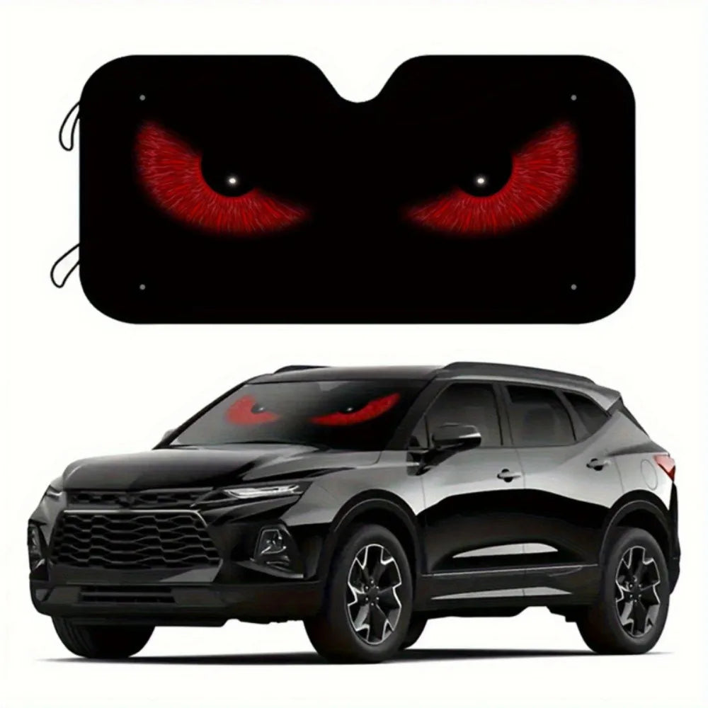 A black SUV with a foldable windshield sun shade installed, featuring a close-up of red eyes.