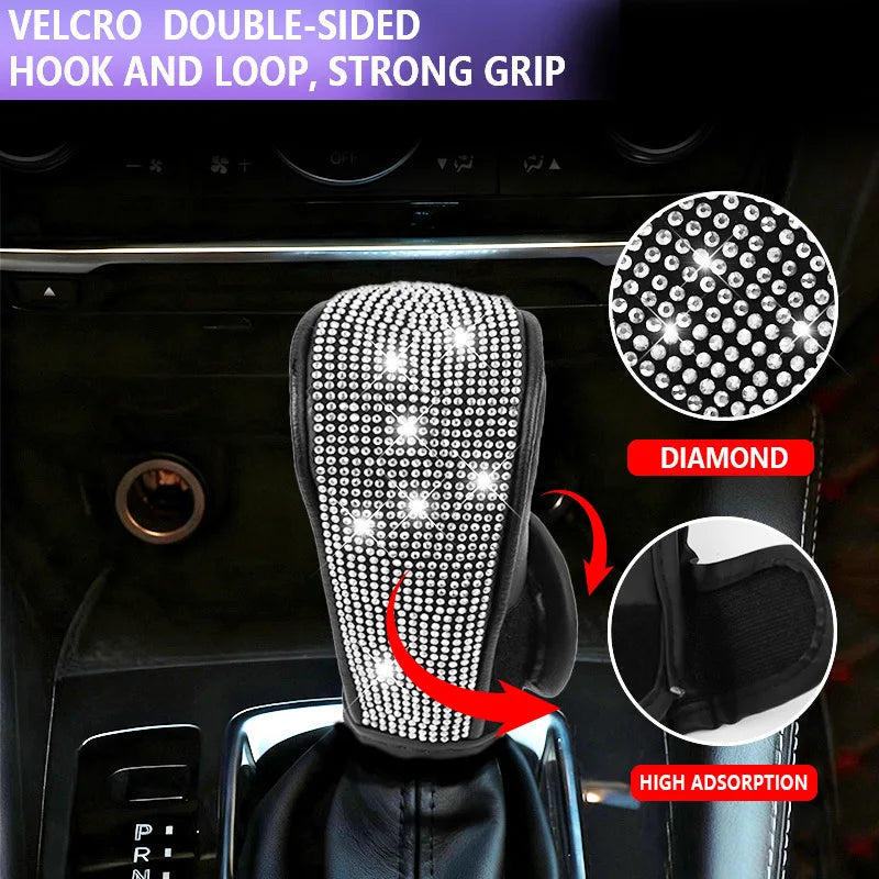 Close-up of a rhinestone gear shift knob cover with a velcro hook and loop grip on a car interior.