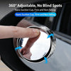 A hand is adjusting a 360° adjustable nano suction cup mirror on a car door to check blind spots.