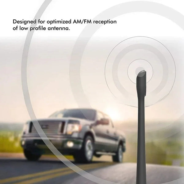A black car radio aerial antenna kit is shown against a blurred background with a vehicle driving on a road.