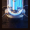 A close-up view of a powerful 5-in-1 portable wireless car vacuum with glowing blue components.