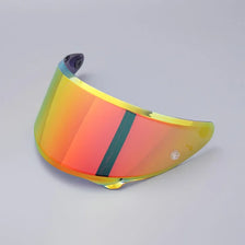 Visor anti-buée orange et jaune translucide pour casque de moto, vue de dessus.