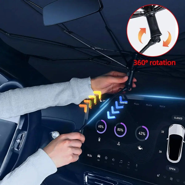 Hands are demonstrating the 360 degree rotation of a foldable car windshield sun shade with a bendable handle.