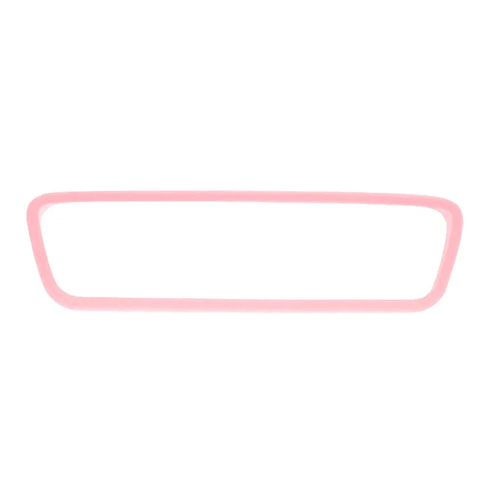 Pink silicone trim for a rearview mirror protector.