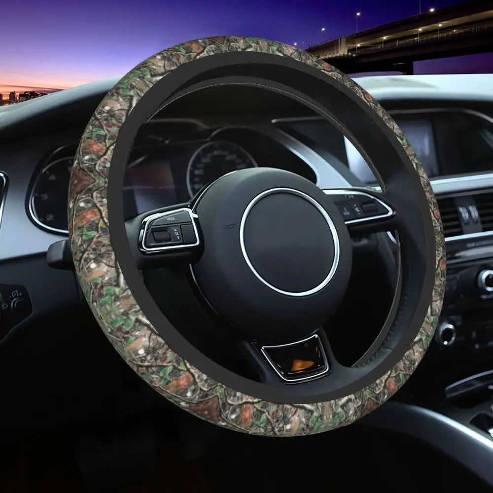 Steering wheel covered in camouflage patterned material inside a car