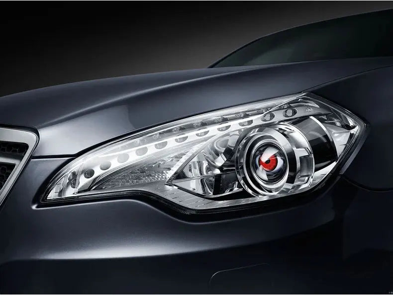 Close-up of a dark car's headlight featuring dynamic LED eye lights.