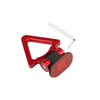 A close-up view of a red racing style car tow hook with a silver wire and black plastic component.