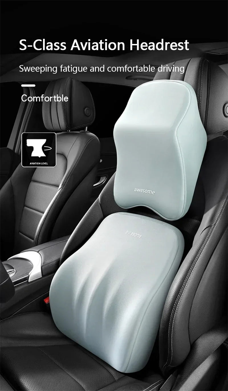 S-Class Aviation Headrest showing a light gray ergonomic cushion installed in a car seat.