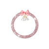 A pink rhinestone bow bell trim featuring clear crystal accents.
