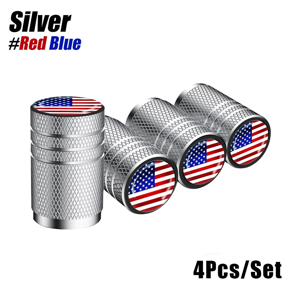 Set of four silver aluminum tire valve caps featuring the American flag design in red, white, and blue.