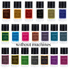 A collection of various black and colored glass bottles of liquid air freshener products.