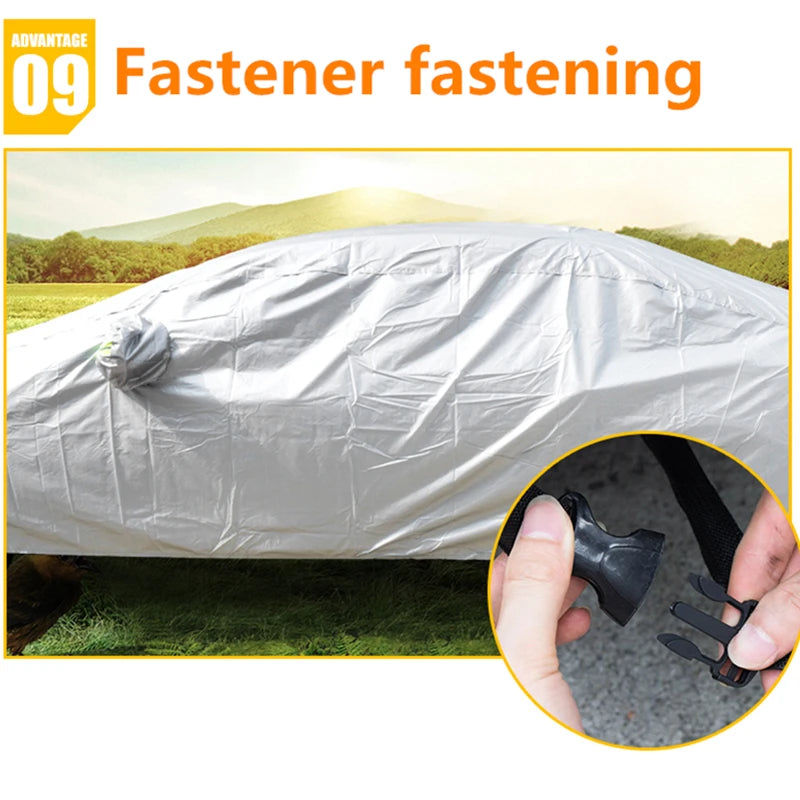 Close-up of a black fastener used for securing a white universal all-weather car cover on an SUV.