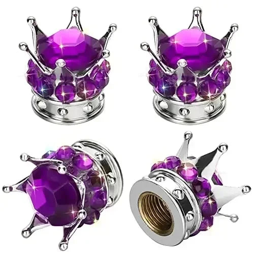A set of silver-toned diamond rhinestone tire valve caps featuring purple and clear gemstone accents.