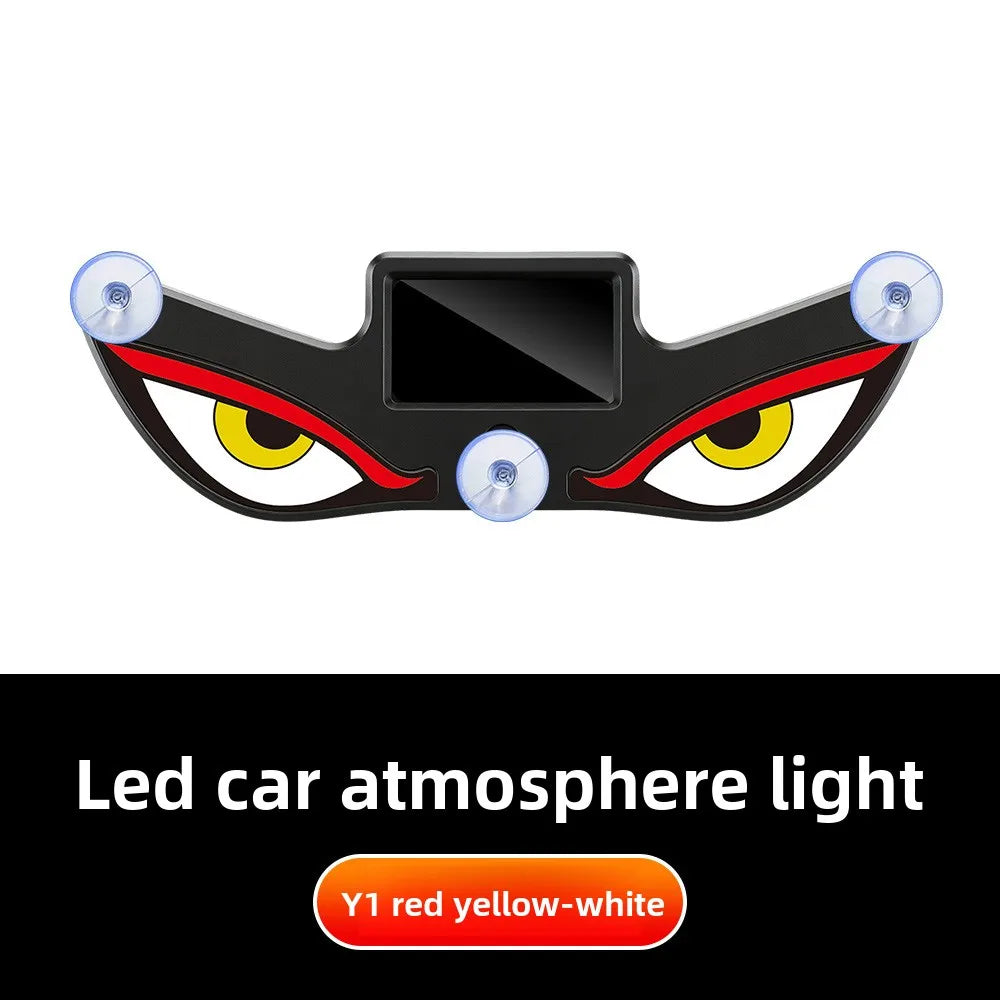 Una luz automotriz negra con luz de ambiente LED amarillo-blanco.
