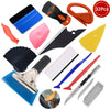 A kit of various tools for car vinyl tint film installation, including cutters, scrapers, and blades.