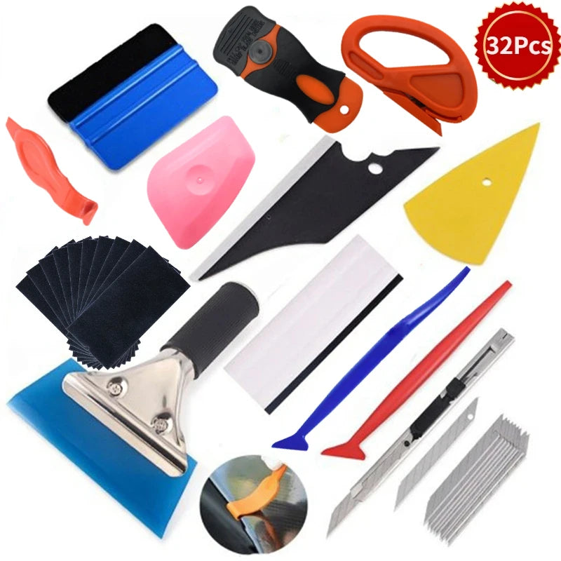 A kit of various tools for car vinyl tint film installation, including cutters, scrapers, and blades.