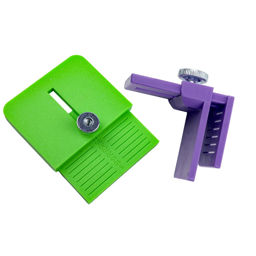 A green precision vinyl film edge cutting applicator with a purple handle and cutting mechanism.