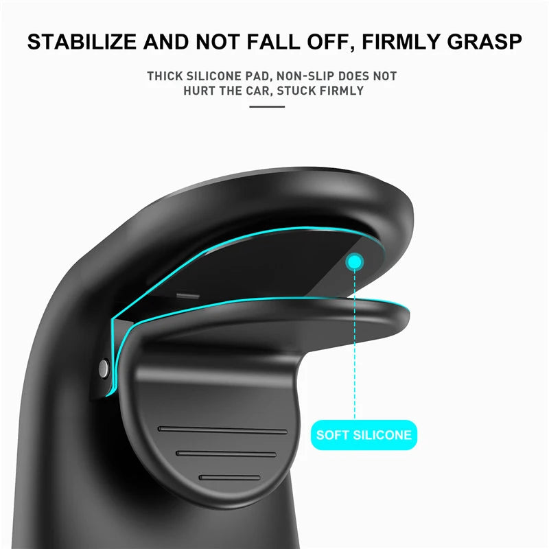 A close-up view of a black magnetic car phone mount with a soft silicone grip and an air vent clip.