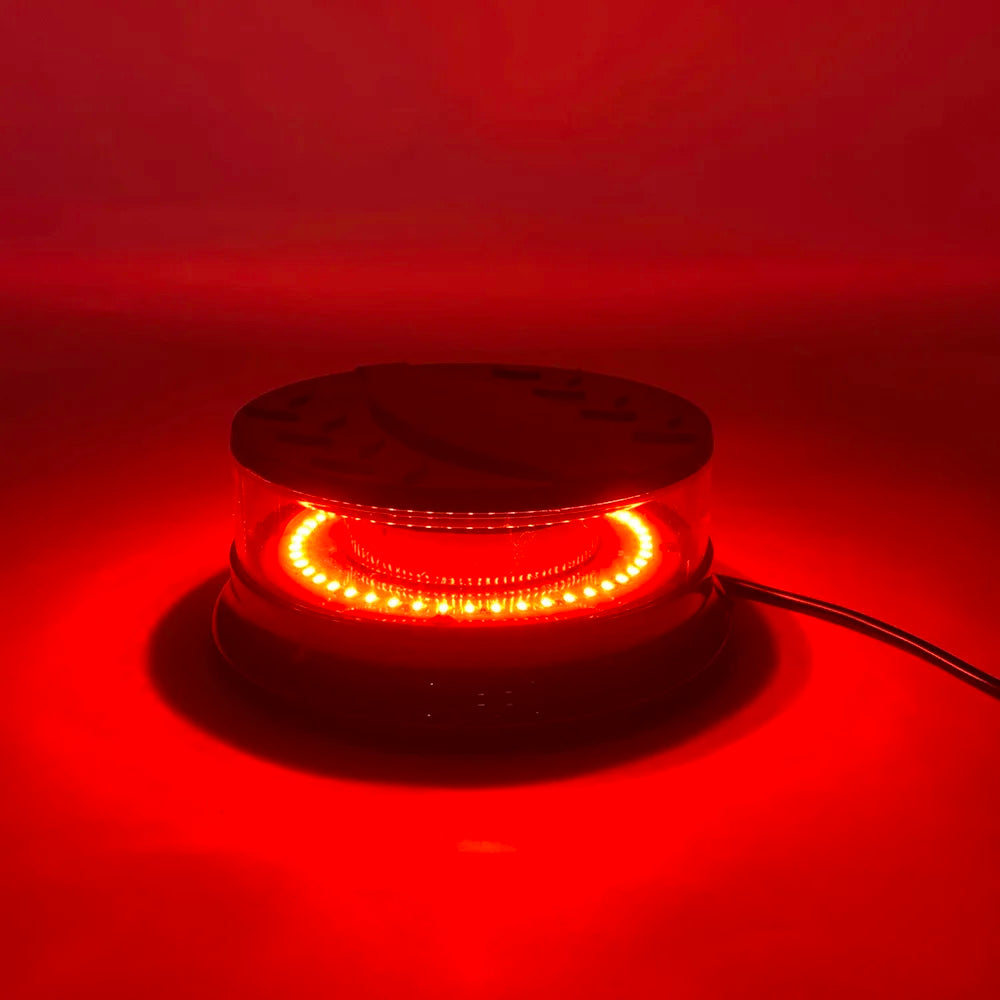 An emergency LED strobe light with a bright red glow is shown against a dark red background.