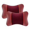 A maroon car headrest pillow designed for neck comfort, featuring a textured fabric and a contrasting trim.