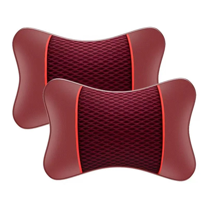 A maroon car headrest pillow designed for neck comfort, featuring a textured fabric and a contrasting trim.