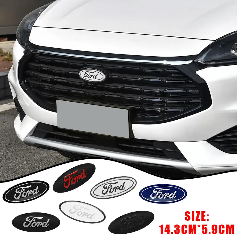 A close-up of a white Ford vehicle's front grille and emblem, with various size Ford badges shown below.