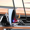 A magnetic wireless charging phone mount is shown mounted on a car dashboard, with a smartphone resting on it.