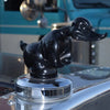 A glossy black decorative angry duck hood ornament for a car or motorcycle.
