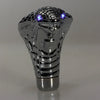A silver Cobra Snake LED gear shift knob with glowing blue lights.