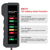 A black digital battery tester with an LED display showing various battery and alternator states like Fault, Good, Full, Midd