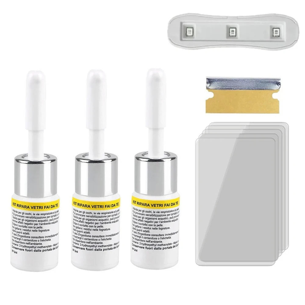A professional windshield crack repair kit showing various tools and components for automotive glass repair.